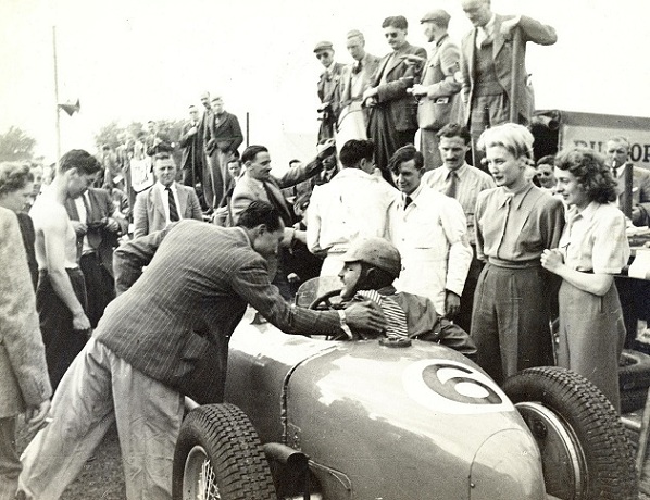 Congratulated by Prince Birabongse of Thailand after coming second in the Ulster Trophy race